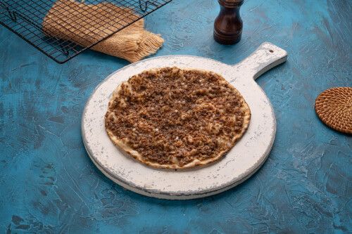 قرص لحم بعجين دبس رمان (غنم)