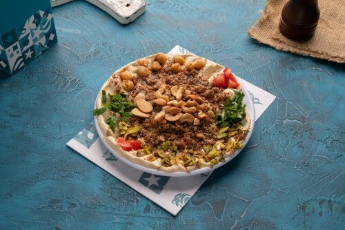 صحن مسبحة مع لحمة ومكسرات